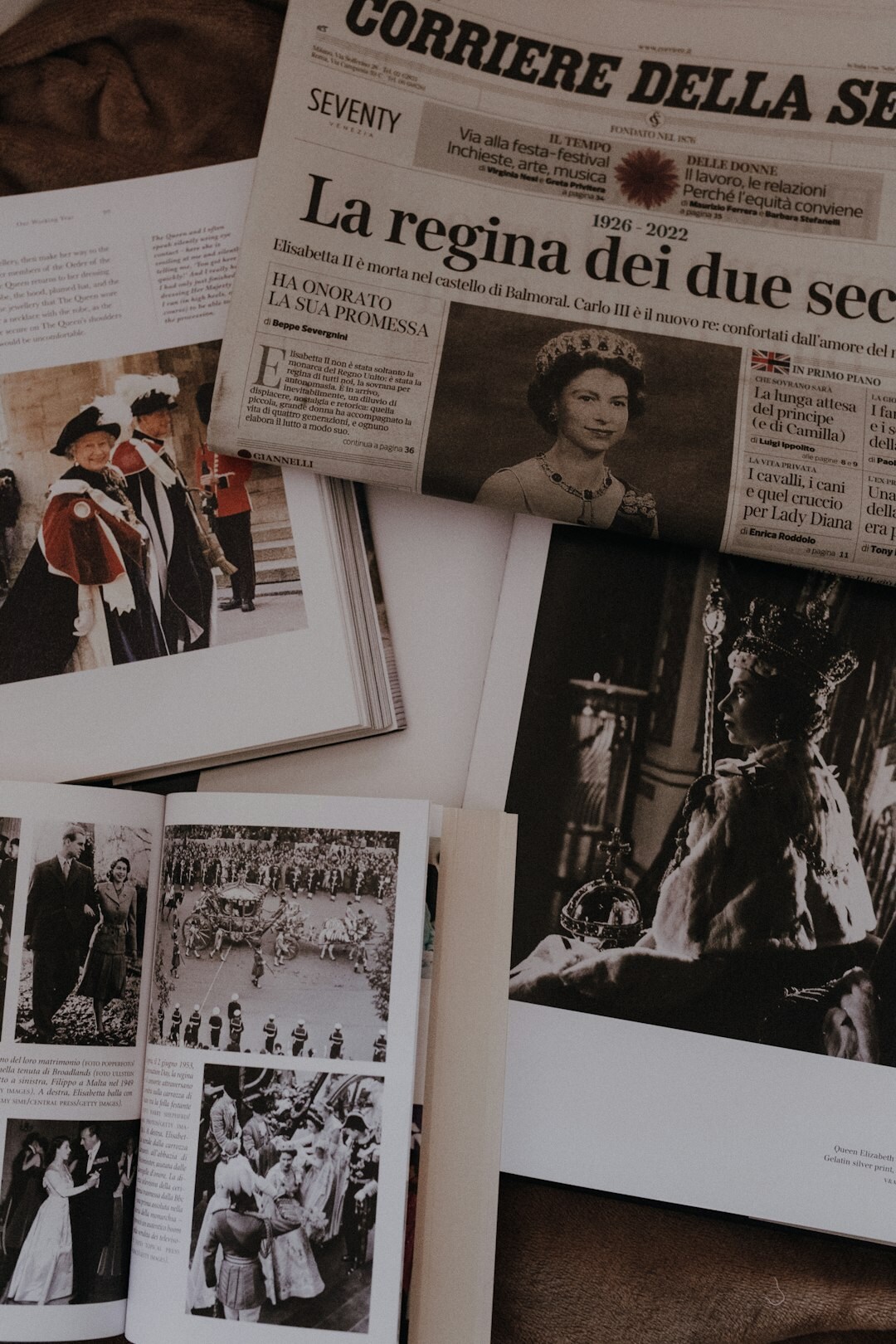 Stacks of vintage fashion magazines and clippings