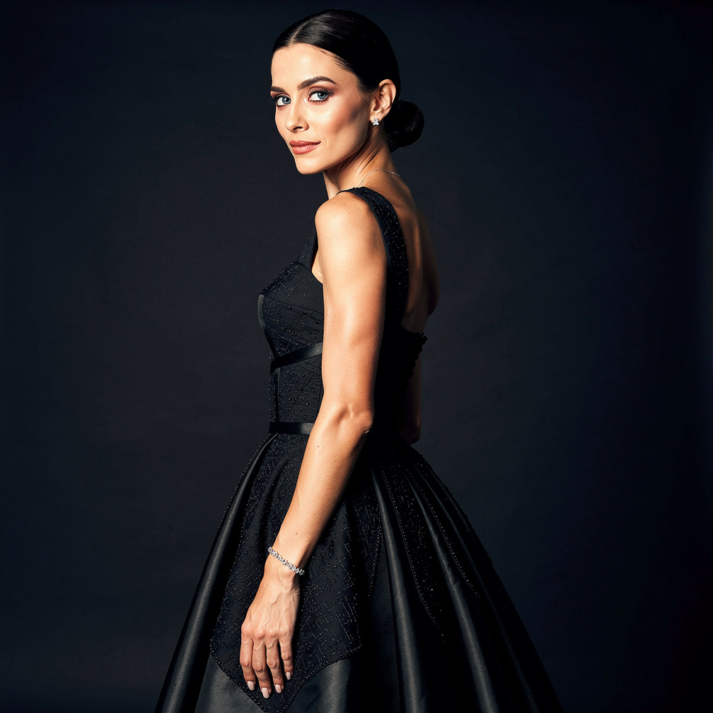 Elegant woman in a couture gown at a gala event