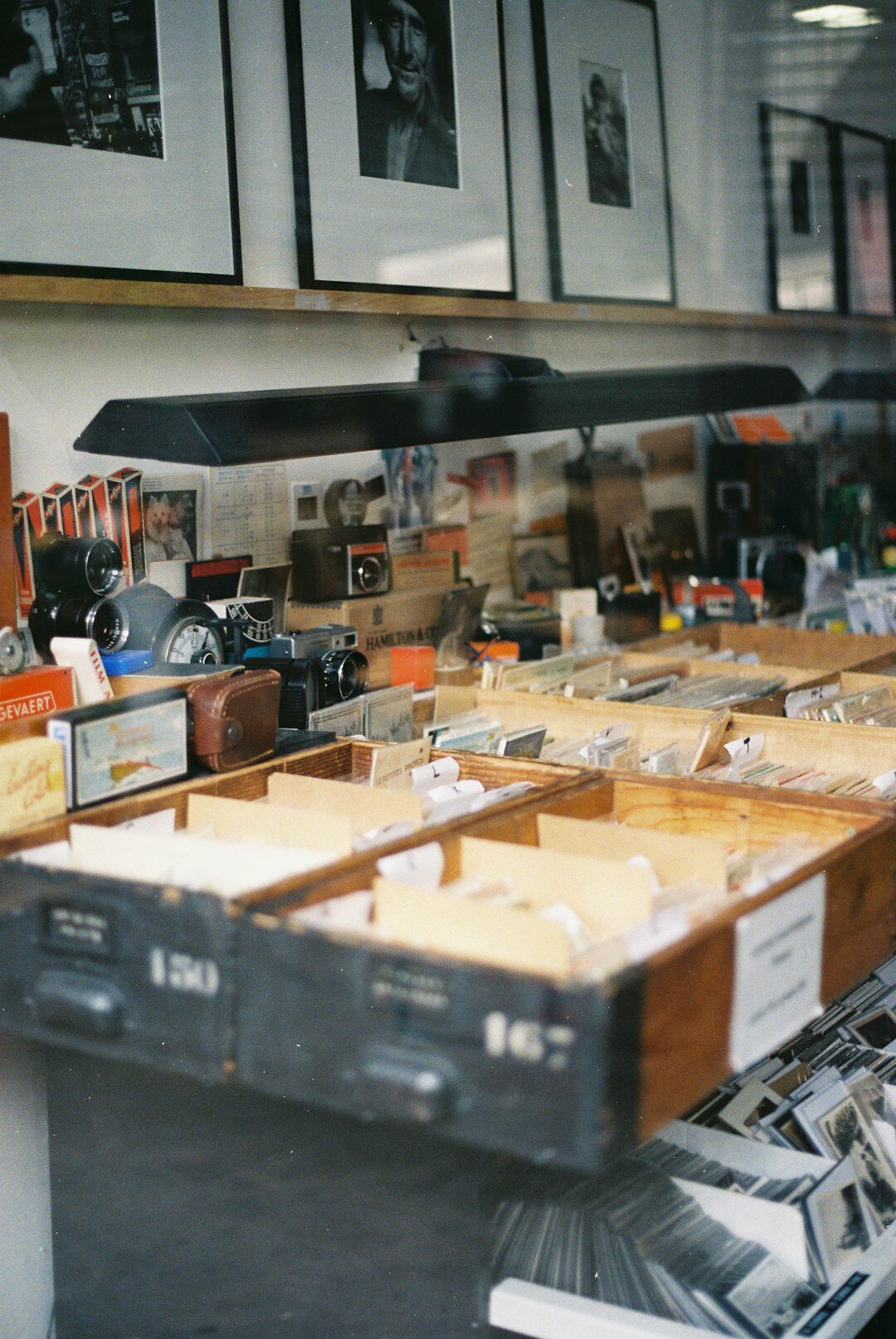 Vintage film reels stacked in an archive